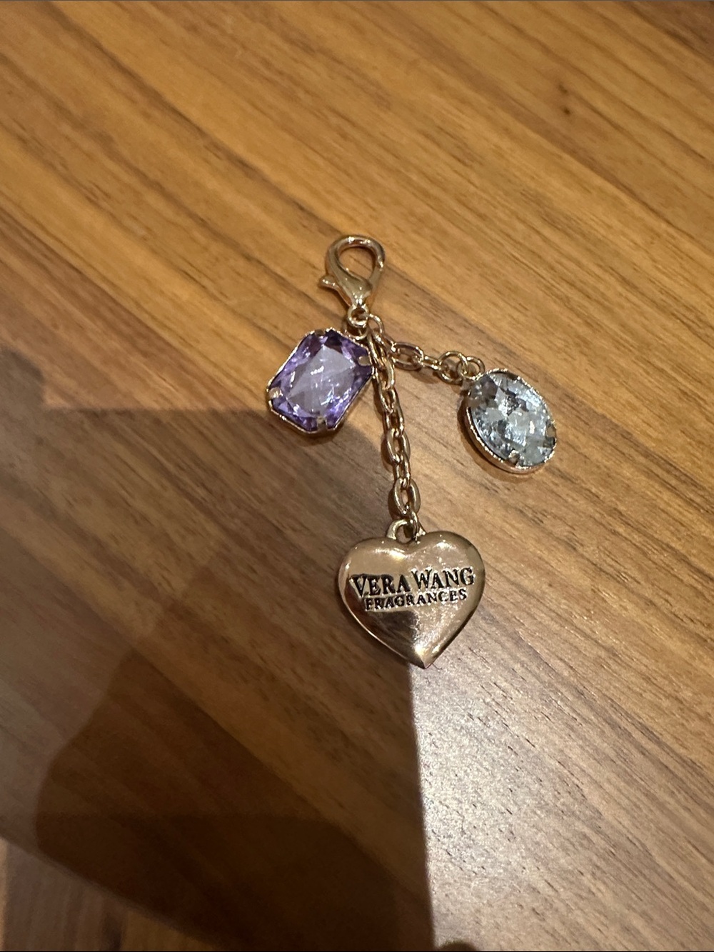 Vera Wang Gold-Tone Heart bag Charm with Purple and Clear Stones